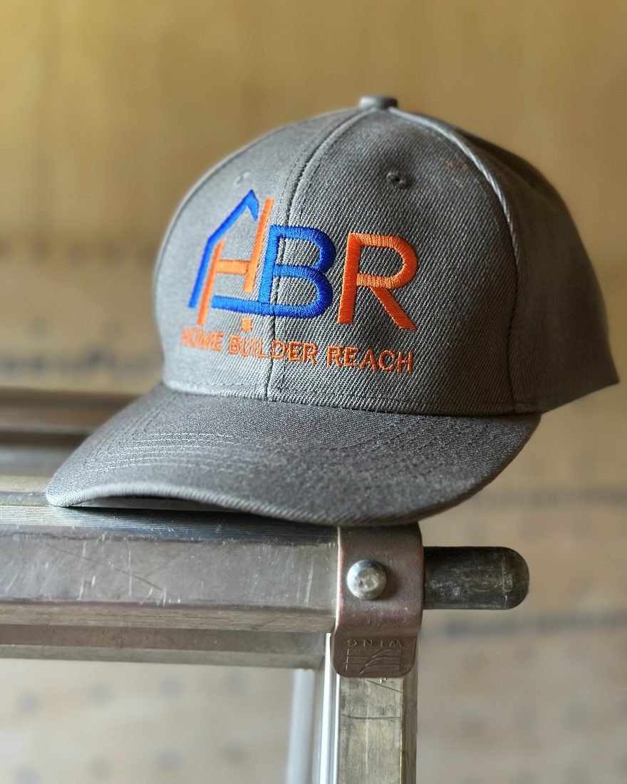 Two-color embroidered logo stitched on a cap front