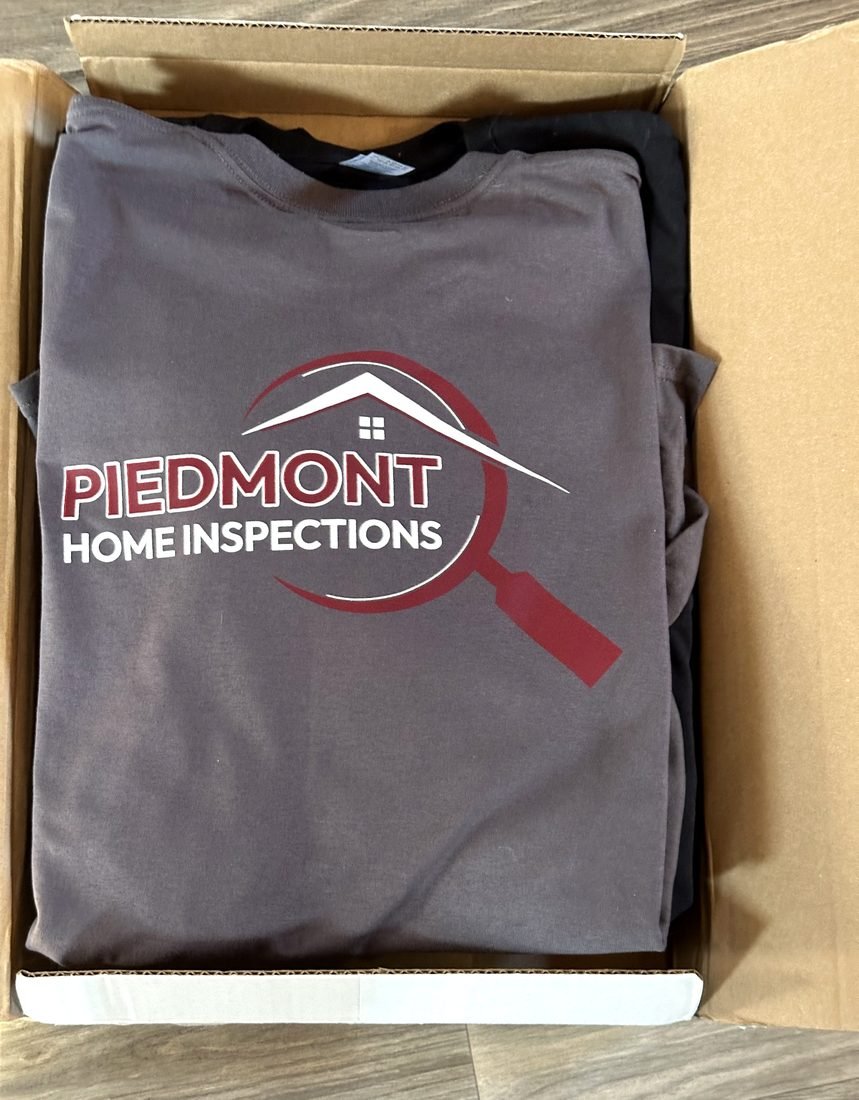A finished custom apparel order boxed for delivery